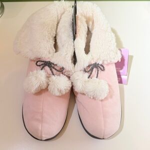Cozy pink slipper booties with plush faux fur and pom-pom ties